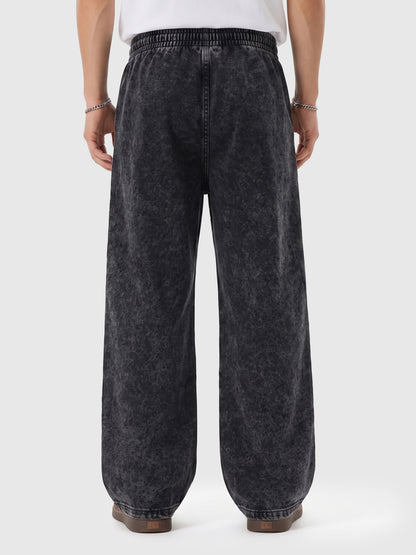 Model wearing A3507 vintage straight-leg sweatpants in Washed Black, back view
