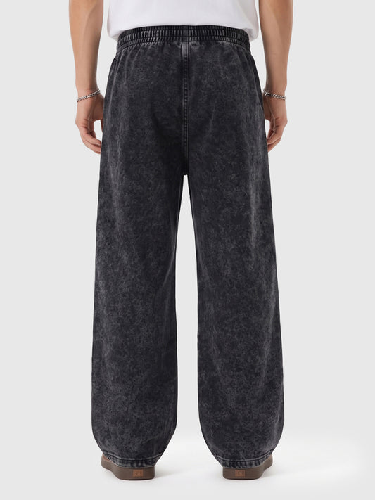 Model wearing A3507 vintage straight-leg sweatpants in Washed Black, back view