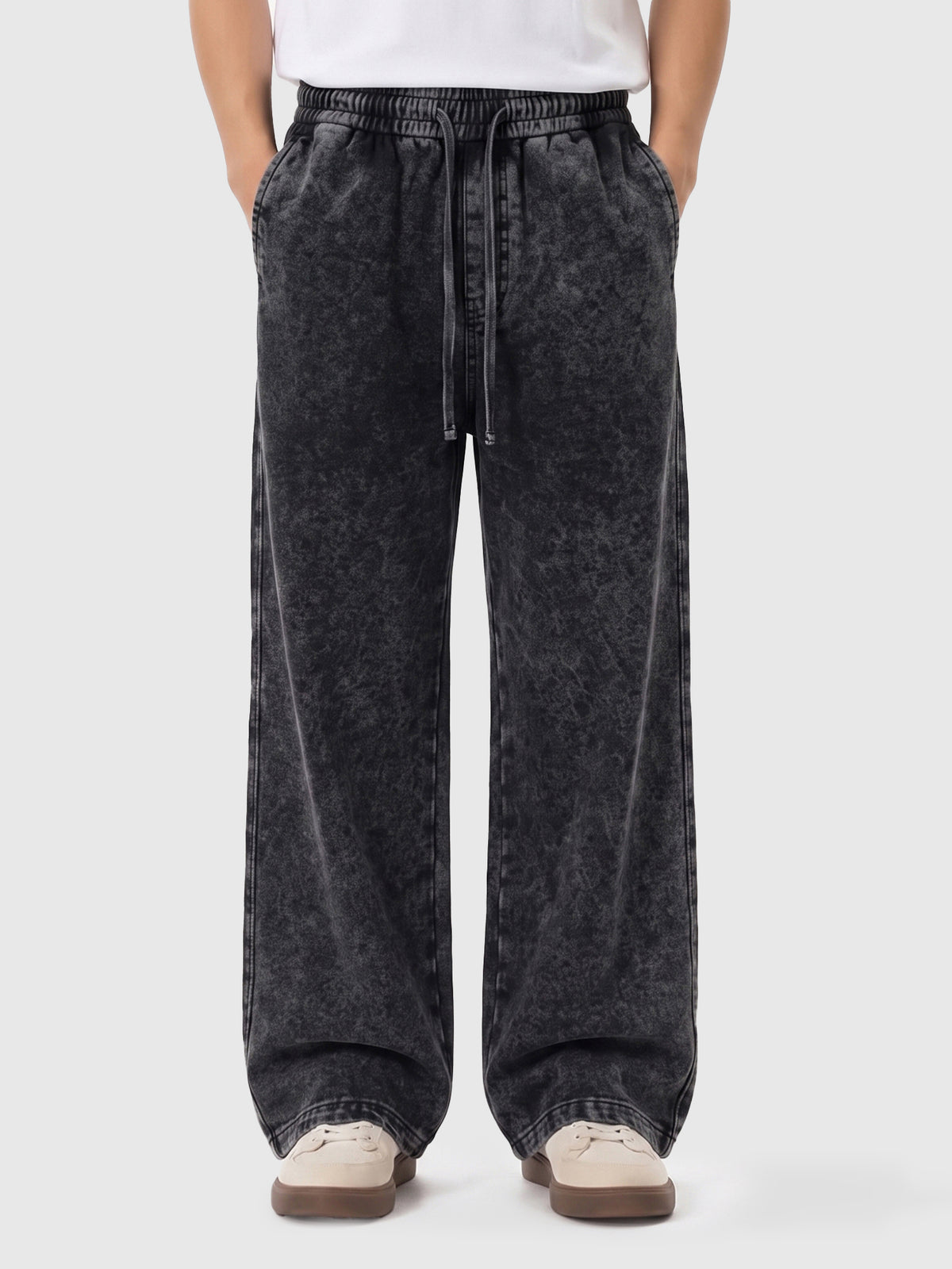 Model wearing A3507 vintage straight-leg sweatpants in Washed Black, front view