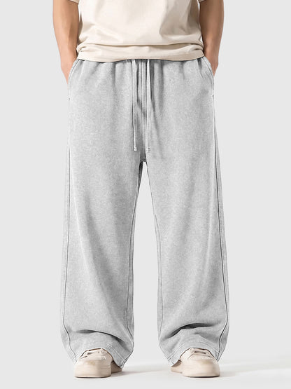 Model wearing A3507 vintage straight-leg sweatpants in Washed Gray, front view