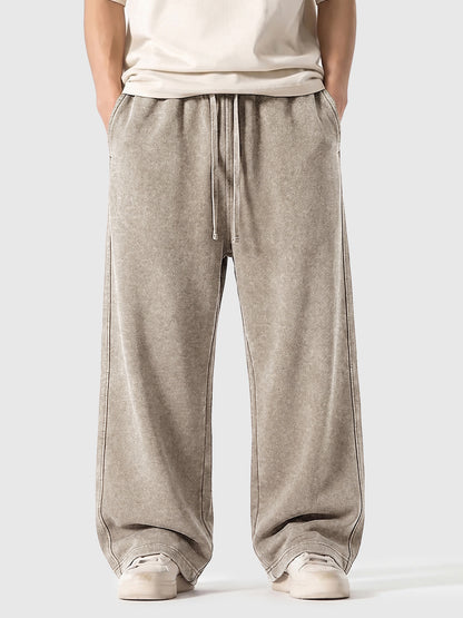 Model wearing A3507 vintage straight-leg sweatpants in Washed Light Brown, front view