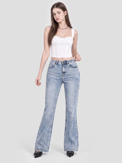 Model wearing B2228 women's flare denim jeans in Light Blue, front view 1