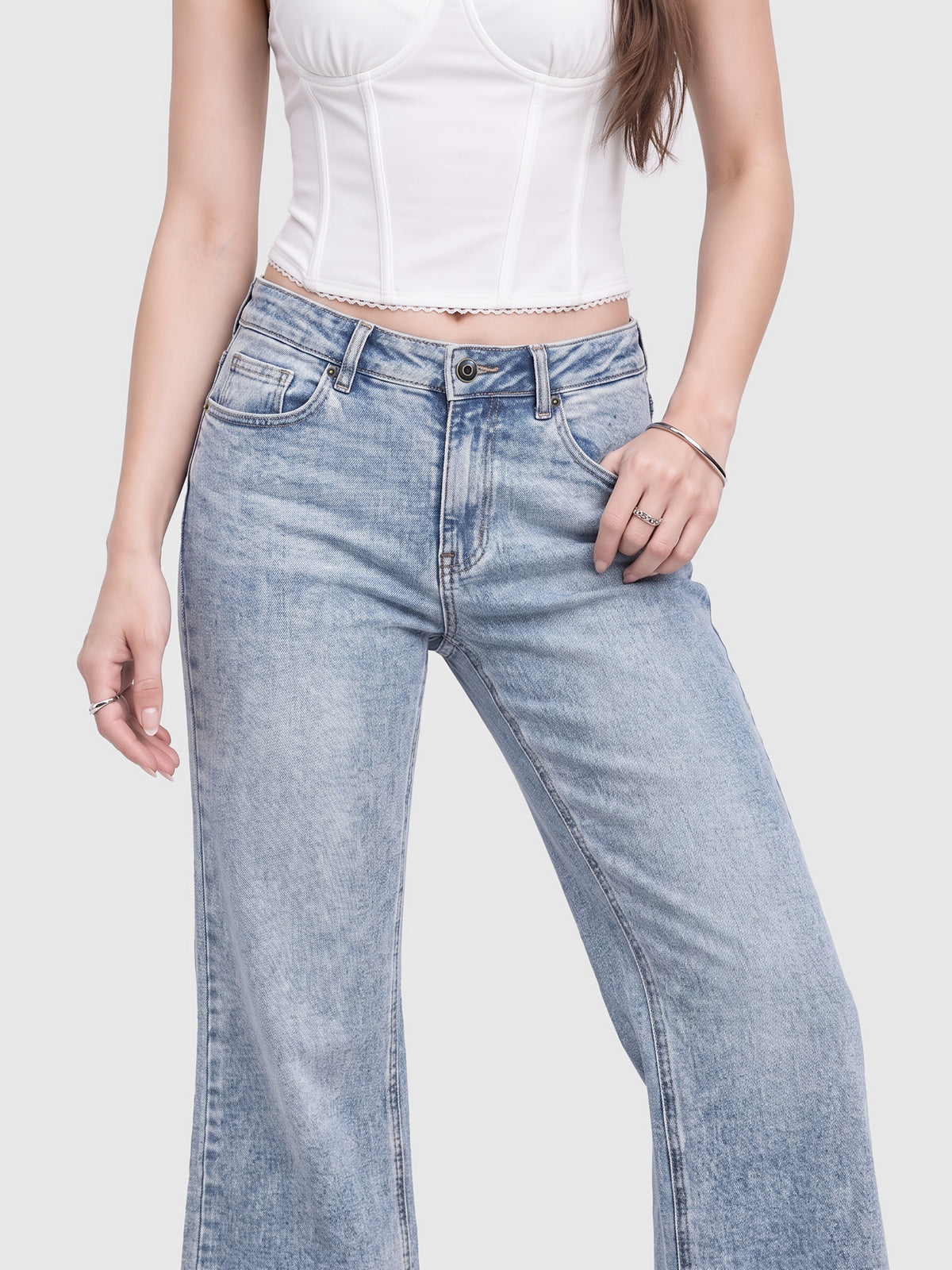 Model wearing B2228 women's flare denim jeans in Light Blue, front view 2