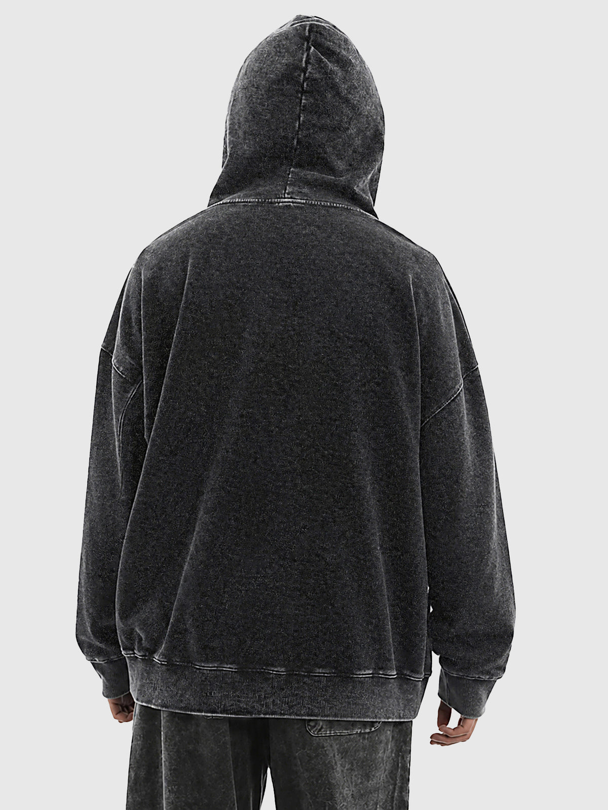 Model wearing B3508 vintage pullover hoodie in Washed Black, back view 2