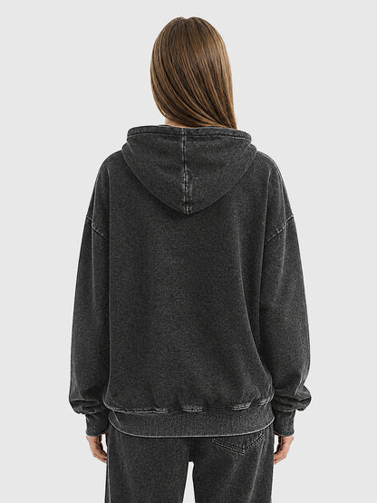 Model wearing B3508 vintage pullover hoodie in Washed Black, back view 1