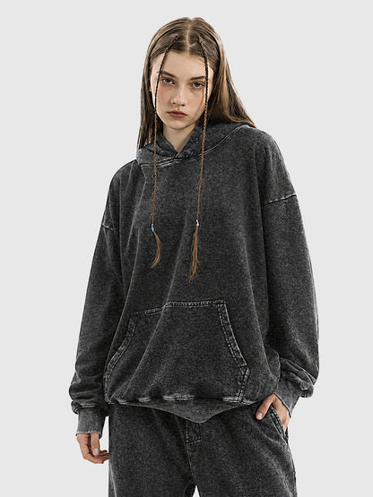 Model wearing B3508 vintage pullover hoodie in Washed Black, front view 1