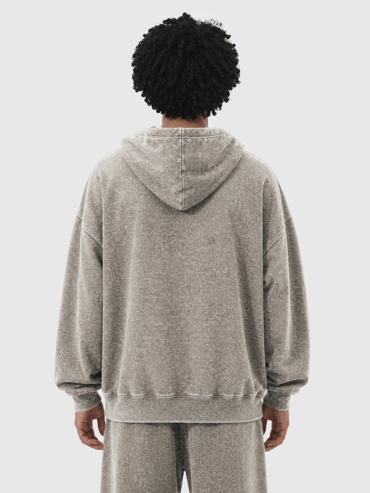 Model wearing B3508 vintage pullover hoodie in Washed Light Brown, back view 2