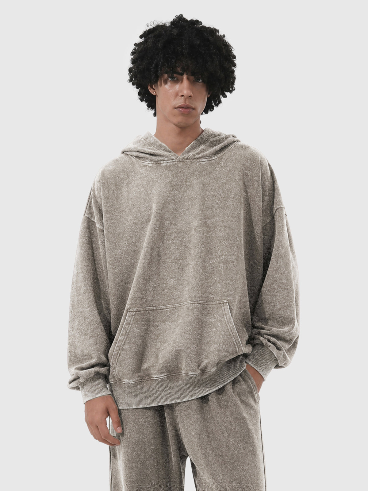 Model wearing B3508 vintage pullover hoodie in Washed Light Brown, front view 2