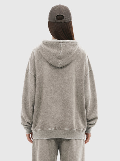 Model wearing B3508 vintage pullover hoodie in Washed Light Brown, back view 1