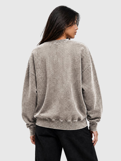 Model wearing Y3505 vintage crewneck sweatshirt in Washed Light Brown, back view