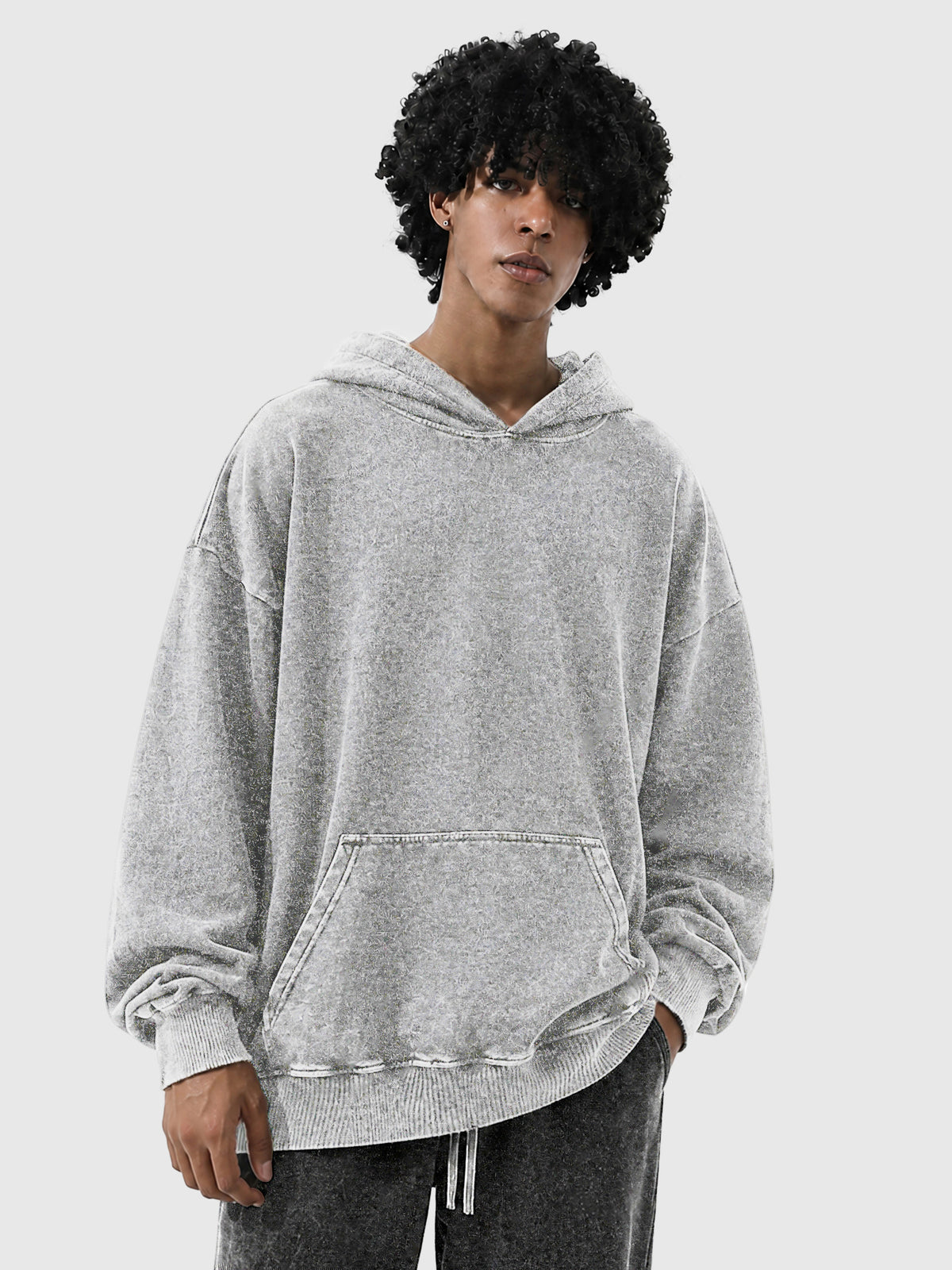 Model wearing B3508 vintage pullover hoodie in Washed Gray, front view 1