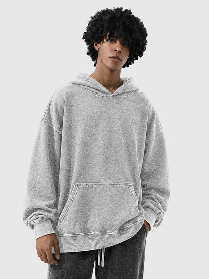 Model wearing B3508 vintage pullover hoodie in Washed Gray, front view 1
