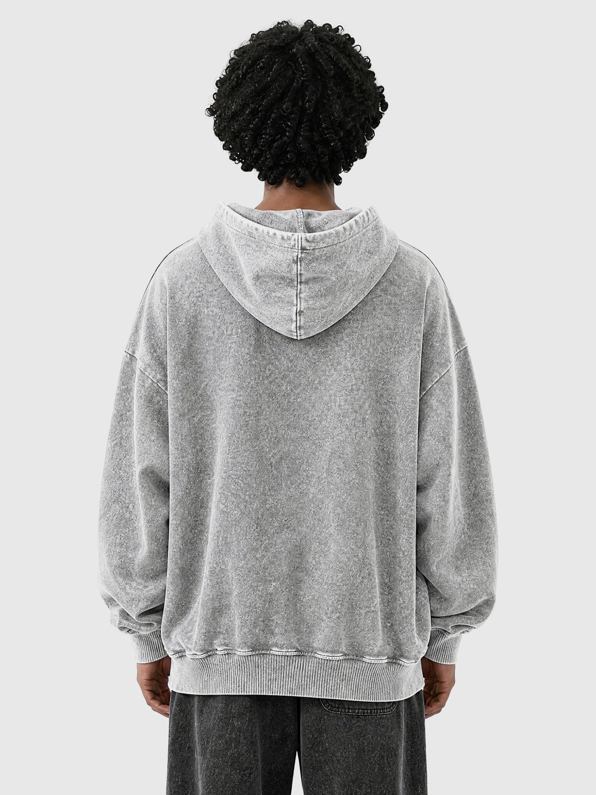 Model wearing B3508 vintage pullover hoodie in Washed Gray, back view 1