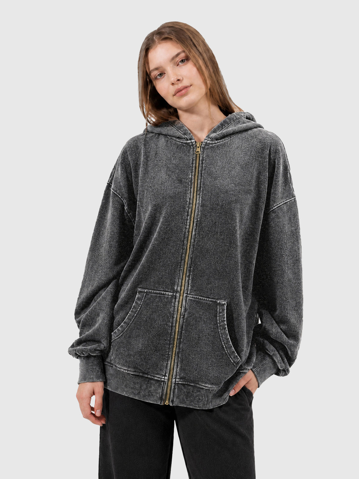 Model wearing B3509 vintage zip-up hoodie in Washed Black, front view