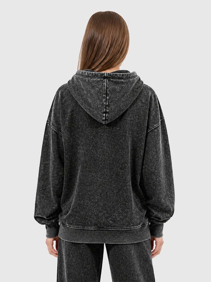 Model wearing B3509 vintage zip-up hoodie in Washed Black, back view