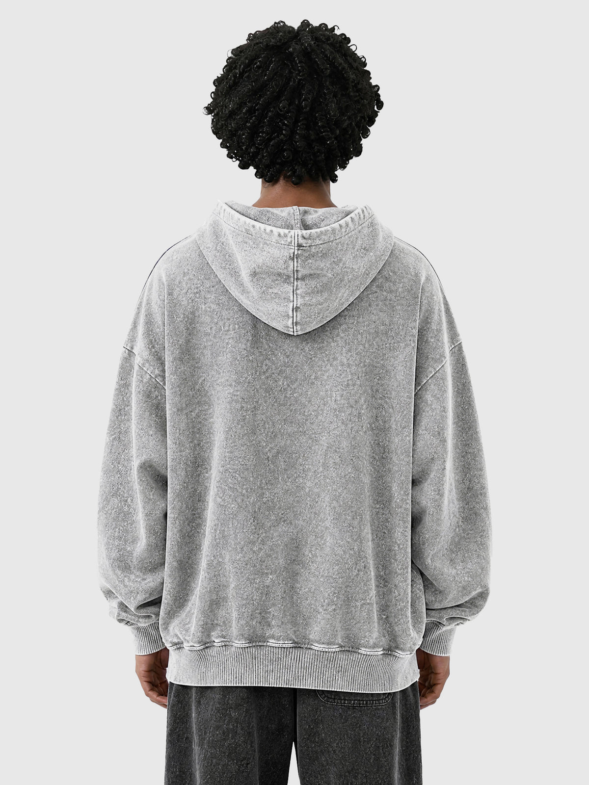 Model wearing B3509 vintage zip-up hoodie in Washed Gray, back view