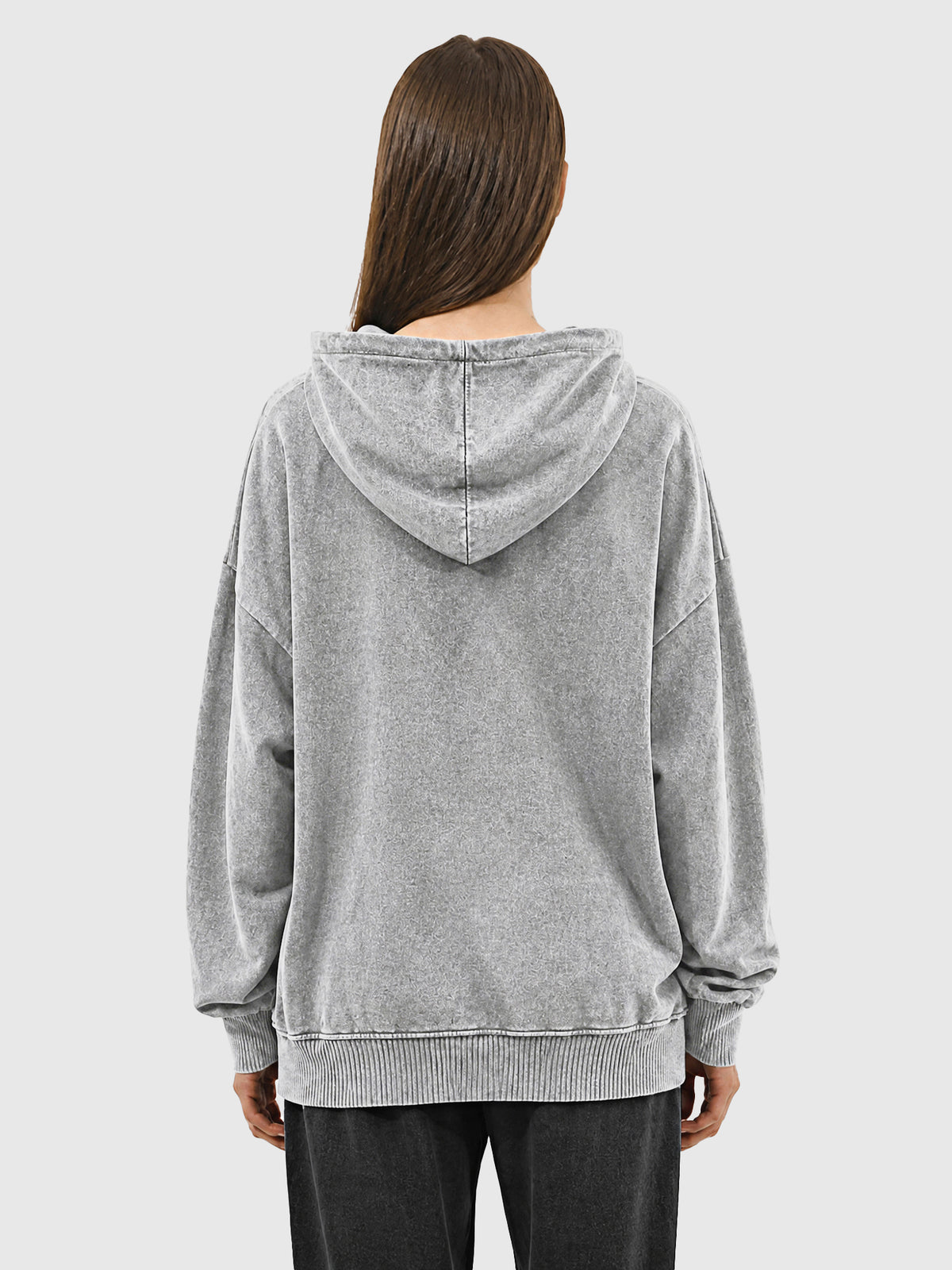 Model wearing B3509 vintage zip-up hoodie in Washed Gray, back view