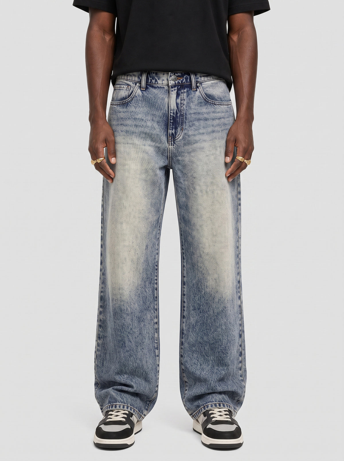 Model wearing B704 men's wide-leg denim jeans in Dusty light Blue, front view