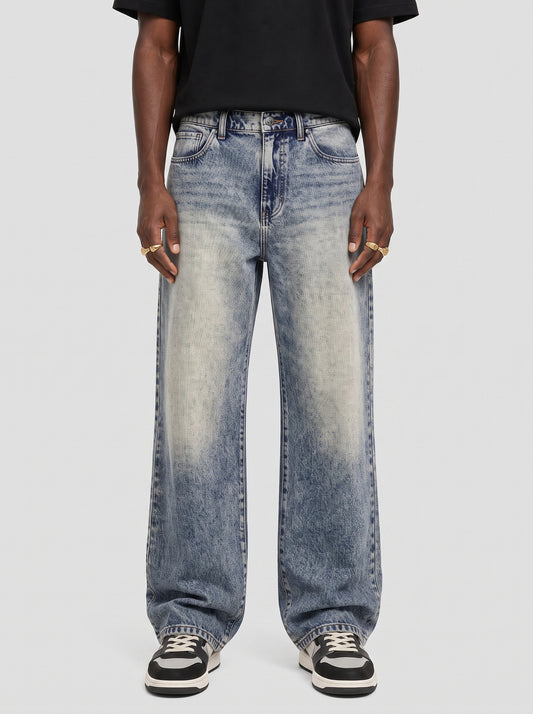 Model wearing B704 men's wide-leg denim jeans in Dusty light Blue, front view