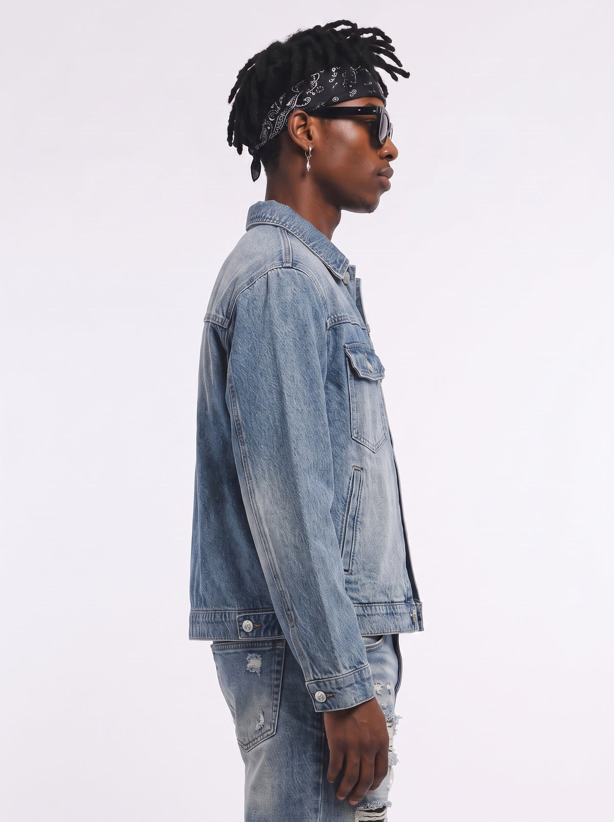 Model wearing B81 denim jacket in Sky Blue, side view