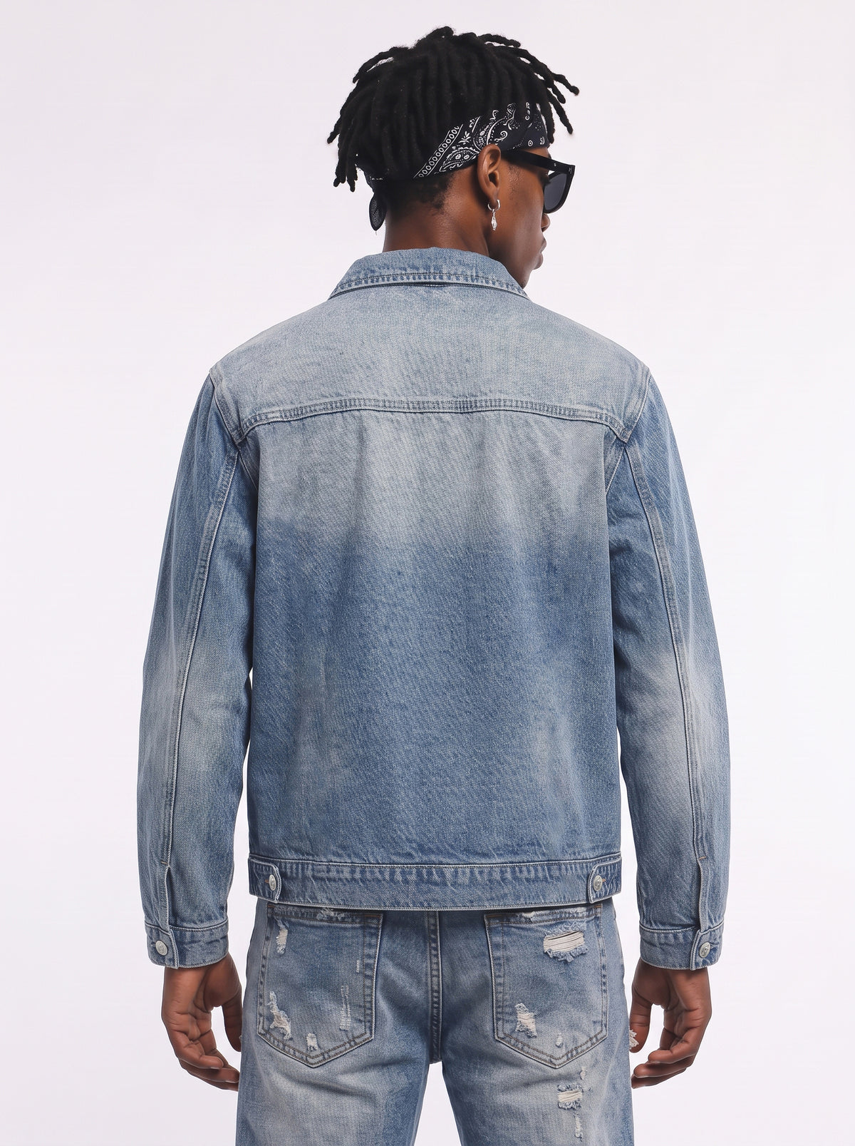 Model wearing B81 denim jacket in Sky Blue, back view