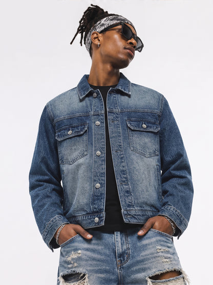 Model wearing B81 denim jacket in Aged Indigo, front view