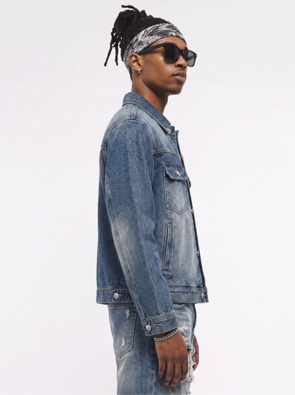 Model wearing B81 denim jacket in Aged Indigo, side view