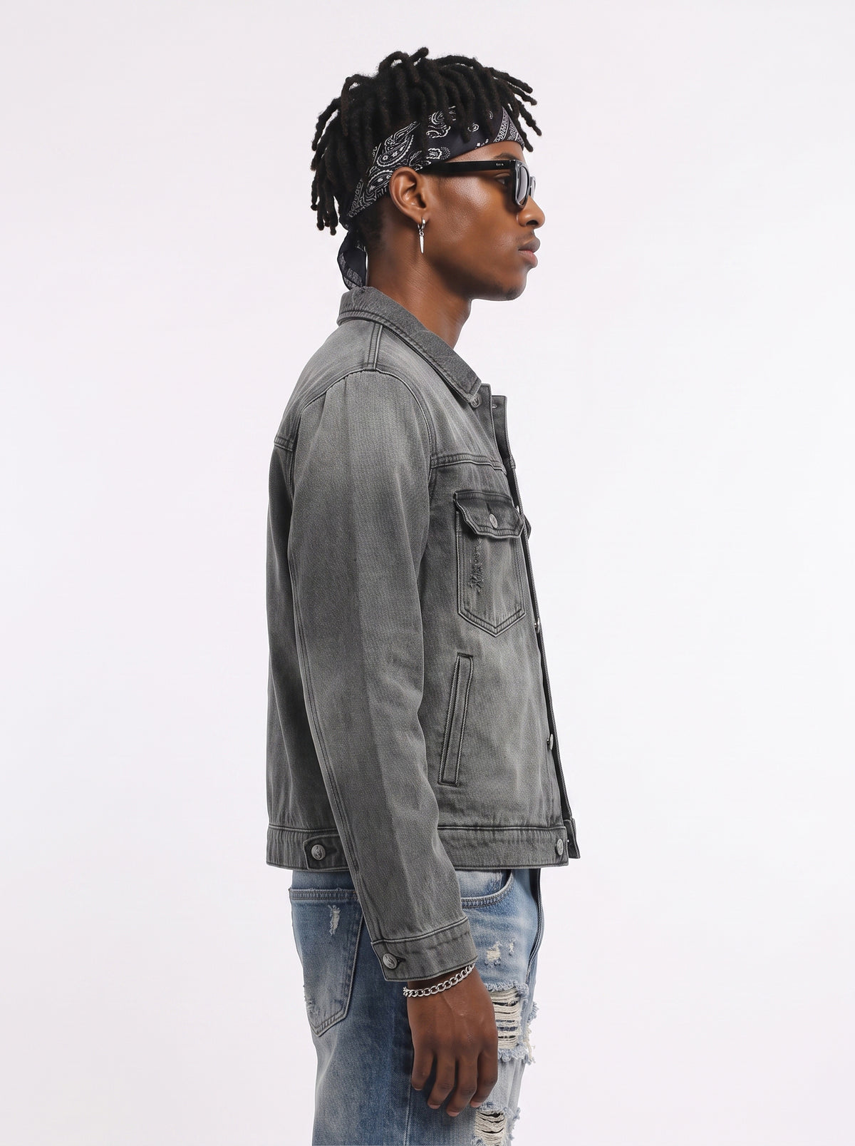 Model wearing B81 denim jacket in Charcoal Grey, side view