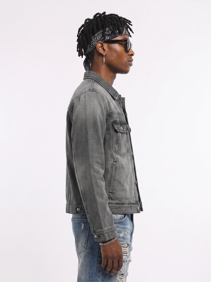 Model wearing B81 denim jacket in Charcoal Grey, side view