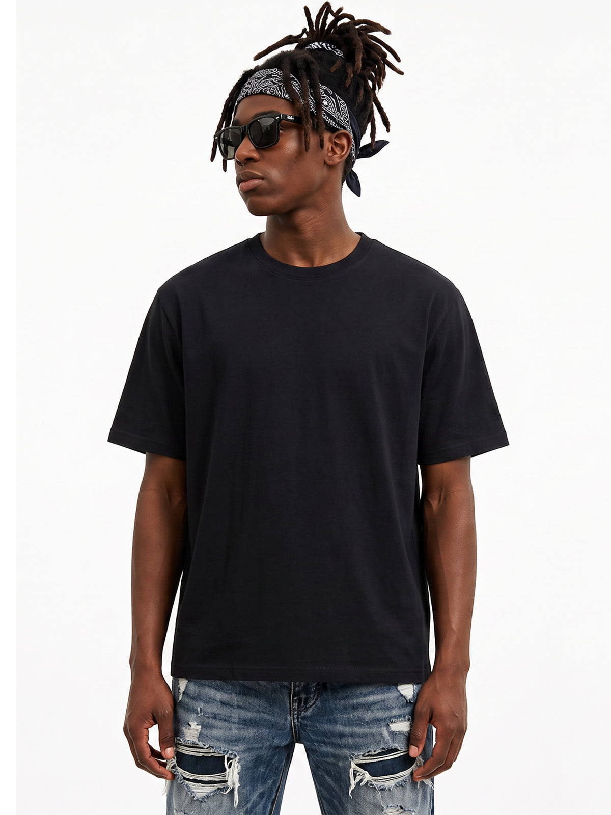 Model wearing US001 basic T-shirt in Black, front view