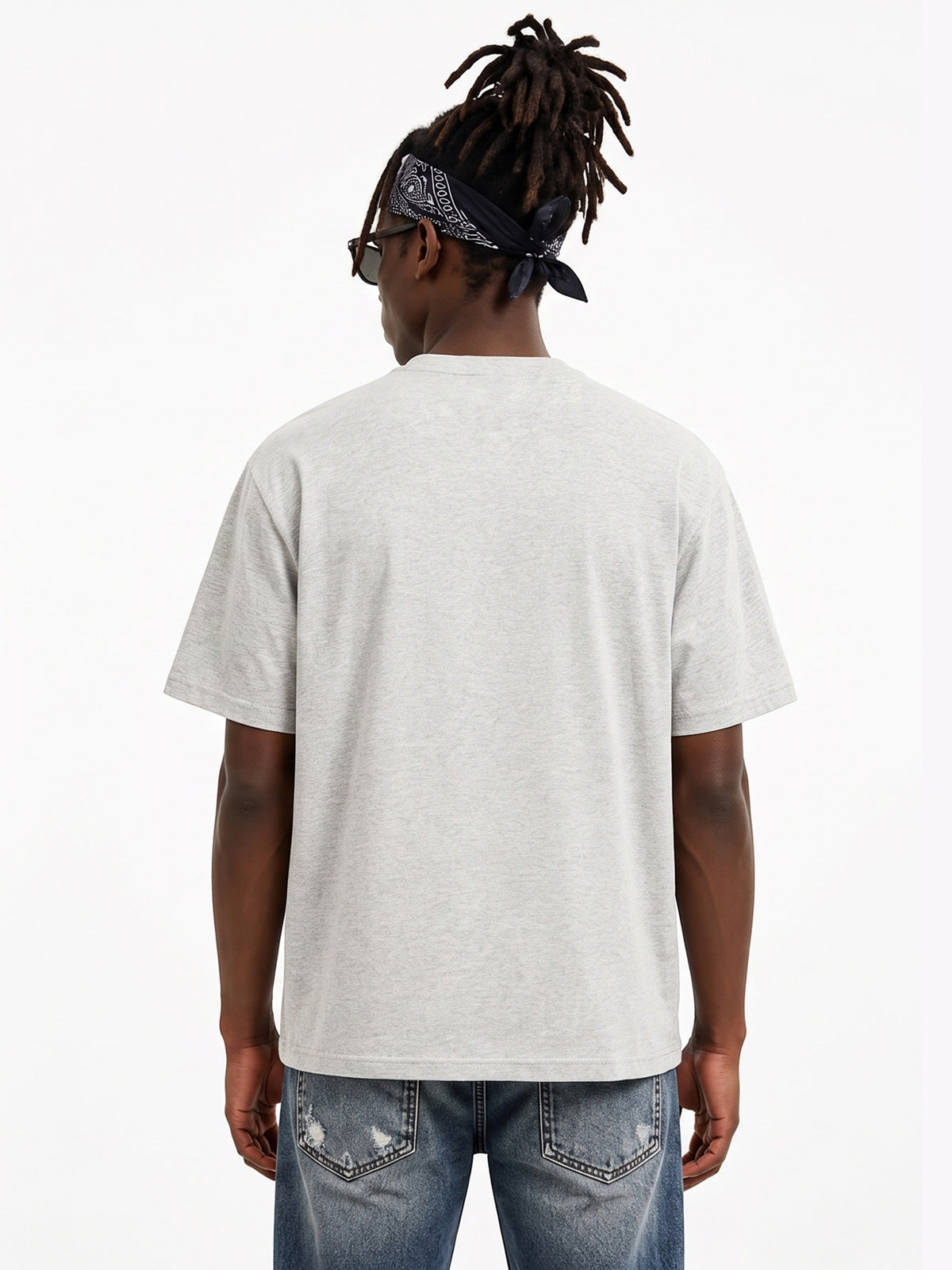 Model wearing US001 basic T-shirt in LightGray, back view
