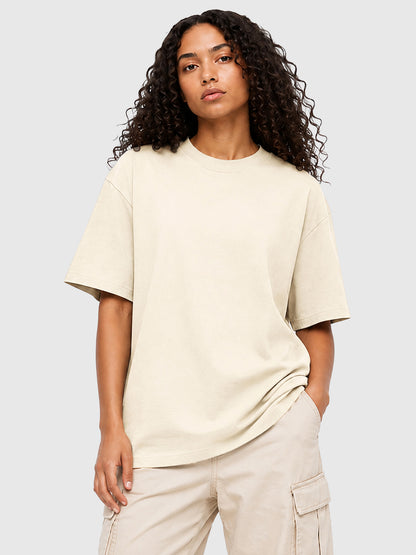 Model wearing C23011 crewneck T-shirt in Apricot , front view