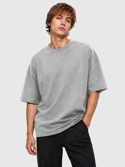 Model wearing C23011 crewneck T-shirt in LightGray, front view