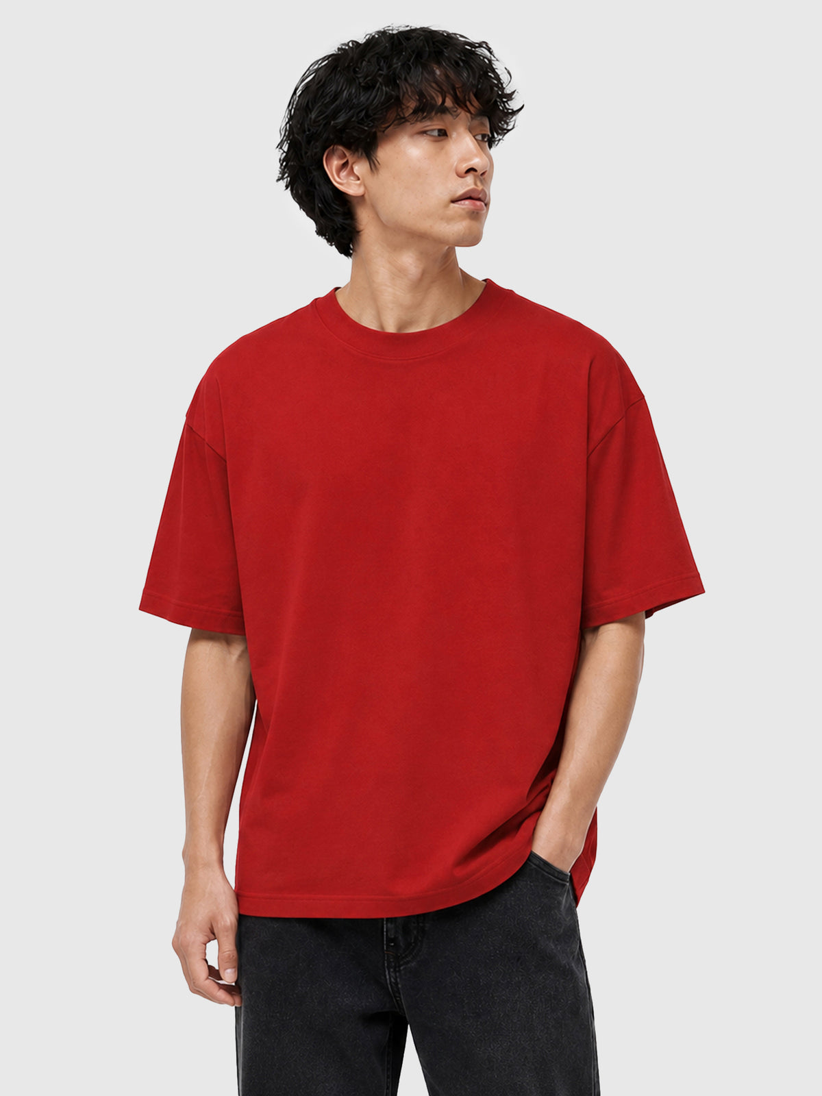 Model wearing C23011 crewneck T-shirt in Red, front view