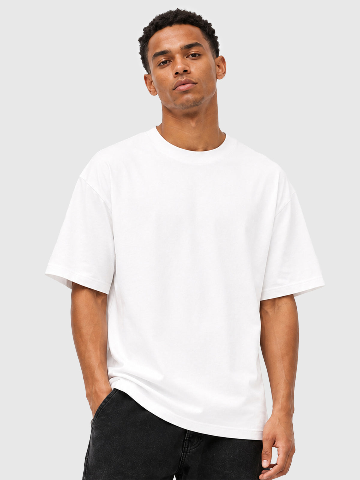 Model wearing C23011 crewneck T-shirt in White, front view