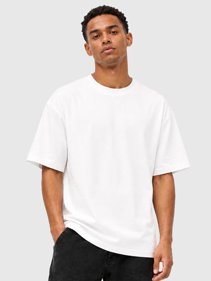 Model wearing C23011 crewneck T-shirt in White, front view