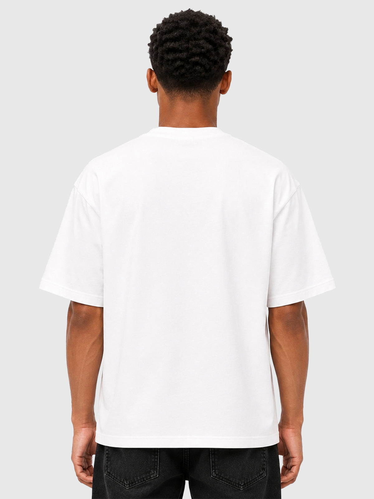 Model wearing C23011 crewneck T-shirt in White, back view