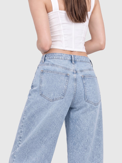 Model wearing JDP2512-15 women's wide-leg denim jeans in Light Blue, back view