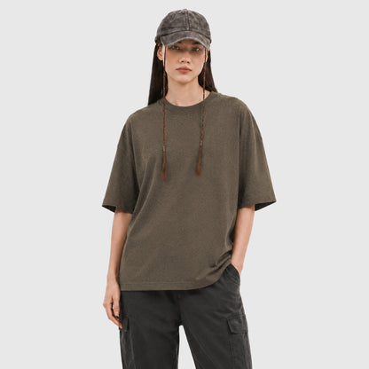 Model wearing X26011 vintage washed T-shirt in Washed Brown, front view