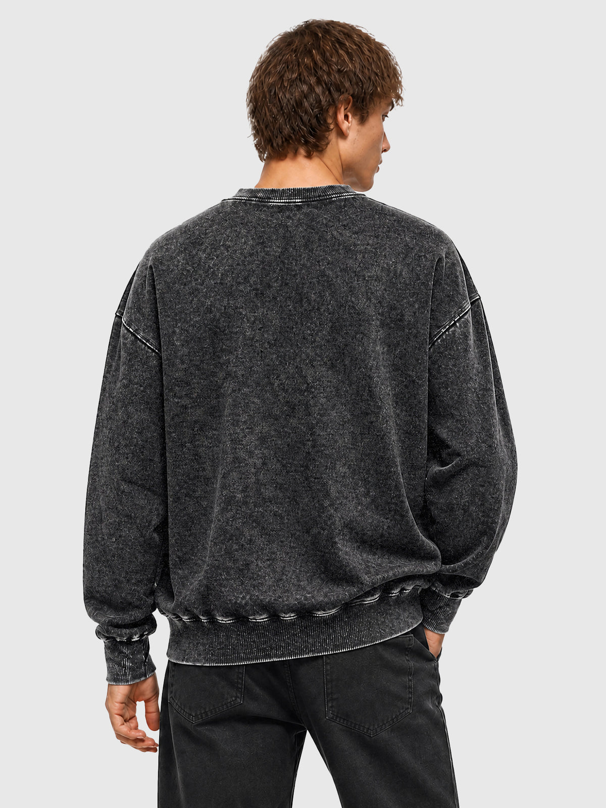 Model wearing Y3505 vintage crewneck sweatshirt in Washed Black, back view